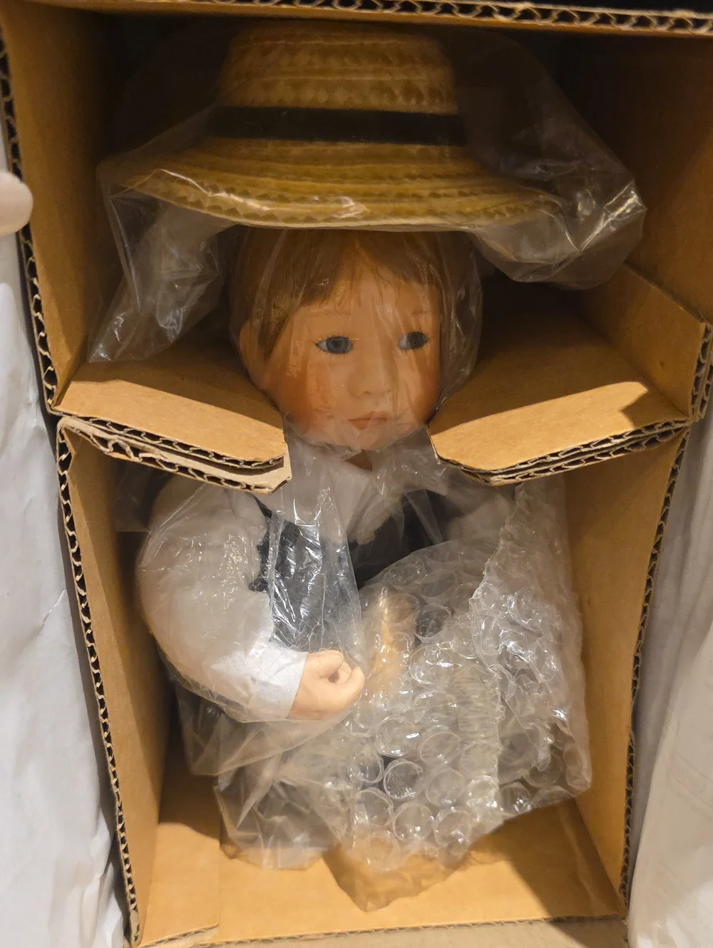 Porcelain Collector Doll with Yellow Straw Hat and White Outfit